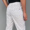 PANTALON ESTAMPADO CUBIERTO NEGROS F/B "Dcto exclusivo online ultimas talla S y unidades"
